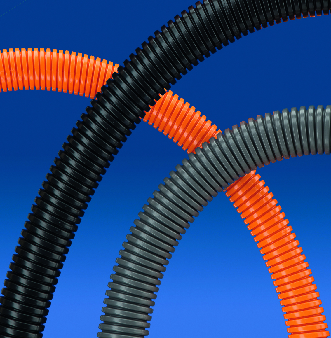 ROHRflex PA-12 corrugated conduits in black, grey and orange